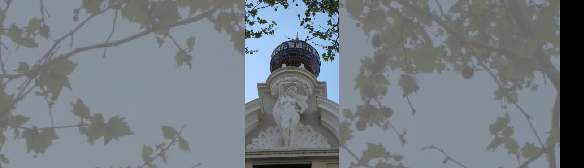 Au sommet une statue de danseuse orientale légèrement vêtue et la phère indiquant Skating (patin à roulettes)